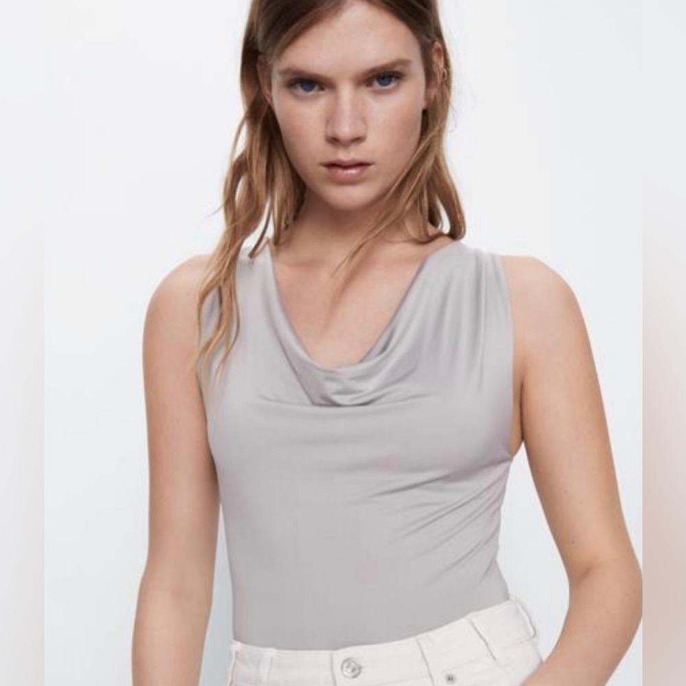 Grey body suit